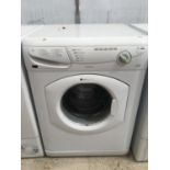 A HOTPOINT AQUARIUS 6KG WASHING MACHINE, LIGHT CLEAN REQUIRED, IN WORKING ORDER