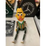 A VINTAGE STYLE WOODEN BERT SHELF PUPPET