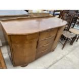 AN OAK SIDEBOARD WITH TWO DOORS AND FOUR DRAWERS