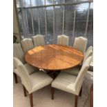 A CIRCULAR MAHOGANY DINING TAB;E AND EIGHT DINING CHAIRS