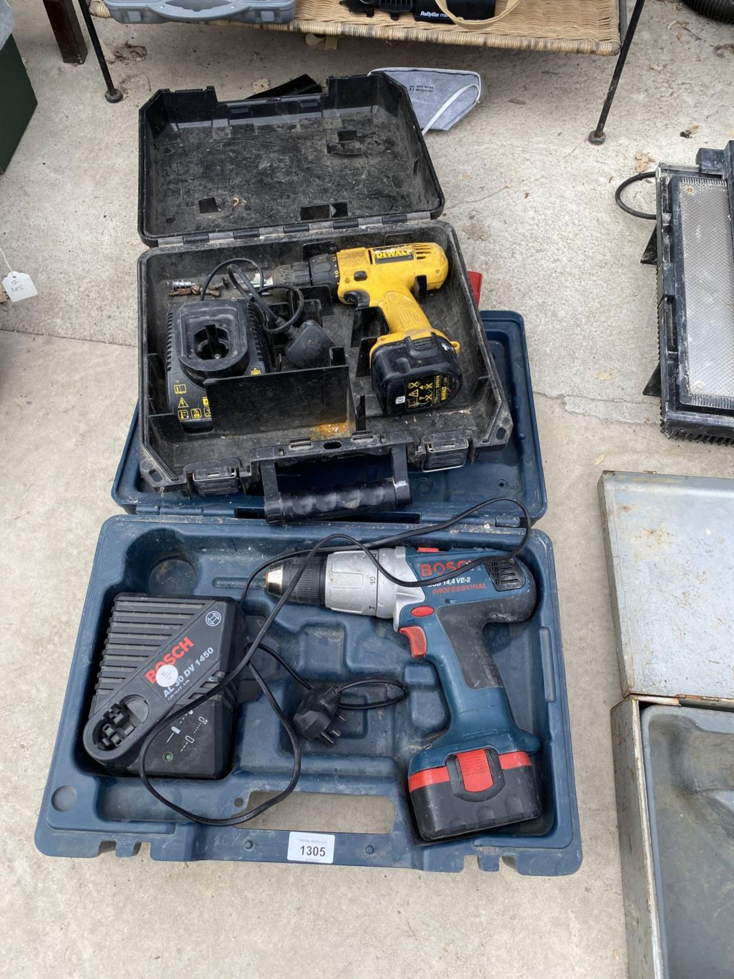 TWO RECHARGEABLE DRILLS - A DEWALT AND A BOSCH, IN WORKING ORDER