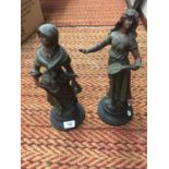 A PAIR OF SIGNED SPELTER FIGURES