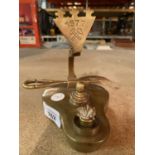 A BRASS OIL LAMP