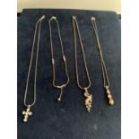 FOUR SILVER NECKLACES