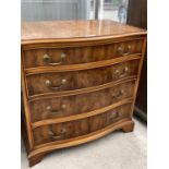A YEW WOOD SERPENTINE FRONT CHEST OF FOUR DRAWERS
