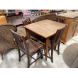 A TEAK DINING TABLE AND FOUR OAK DINING CHAIRS