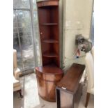 A MAHOGANY CORNER CABINET AND AN MAHOGANY DROP LEAF DINING TABLE