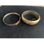 TWO SILVER BANGLES