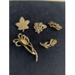 FIVE WHITE METAL BROOCHES