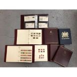 A GREAT BRITAIN AND BRITISH COMMONWEALTH COLLECTION HOUSED IN SIX , MAROON WESTMINSTER BINDERS ,
