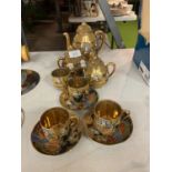 A VINTAGE SAMURAI JAPANESE TEA SET COMPRISING OF A TEAPOT, MILK JUG, SUGAR BOWL AND THREE CUPS AND