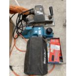 TWO ELECTRIC PLANERS - AN ELU AND A BLACK AND DECKER AND A QUANTITY OF JIGSAW BLADES - BOTH MACHINES