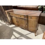 A MAHOGANY SIDEBOARD WITH FOUR DOORS AND THREE DRAWERS