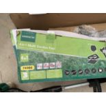 A GARDENLINE 4 IN 1 MULTI GARDEN TOOL IN WORKING ORDER WITH ATTACHMENTS