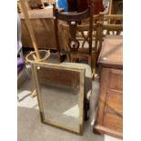 A GILT FRAMED MIRROR AND CARVED MAHOGANY DINING CHAIR
