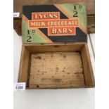 A VINTAGE "LYON'S MILK CHOCOLATE BARS" WOODEN BOX