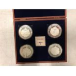 A YEAR OF THE THREE KINGS FOUR COIN COMM SET IN WOODEN CASE