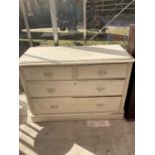 A WHITE PAINTED CHEST OF TWO SHORT AND TWO LONG DRAWERS