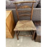 AN OAK DINING CHAIR WITH WOVEN SEAT