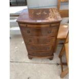 A SMALL MAHOGANY CHEST OF FOUR DRAWERS