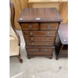 A SMALL MAHOGANY CHEST ON CHEST WITH FOUR SHORT AND FOUR LONG DRAWERS