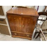 A YEW WOOD CABINET WITH TWO DOORS AND FALL FRONT