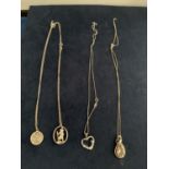 FOUR SILVER NECKLACES