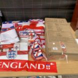 A QUANTITY OF ENGLAND FLAGS, HEADBANDS ETC AND A BOXED SOCCER GOAL REBOUND SET