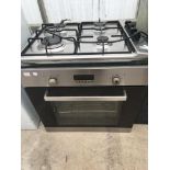 A CANDY GAS HOB WITH A BUILT IN ELECTRIC OVEN, GRILL NOT WORKING, NO PLUG SO UNABLE TO TEST