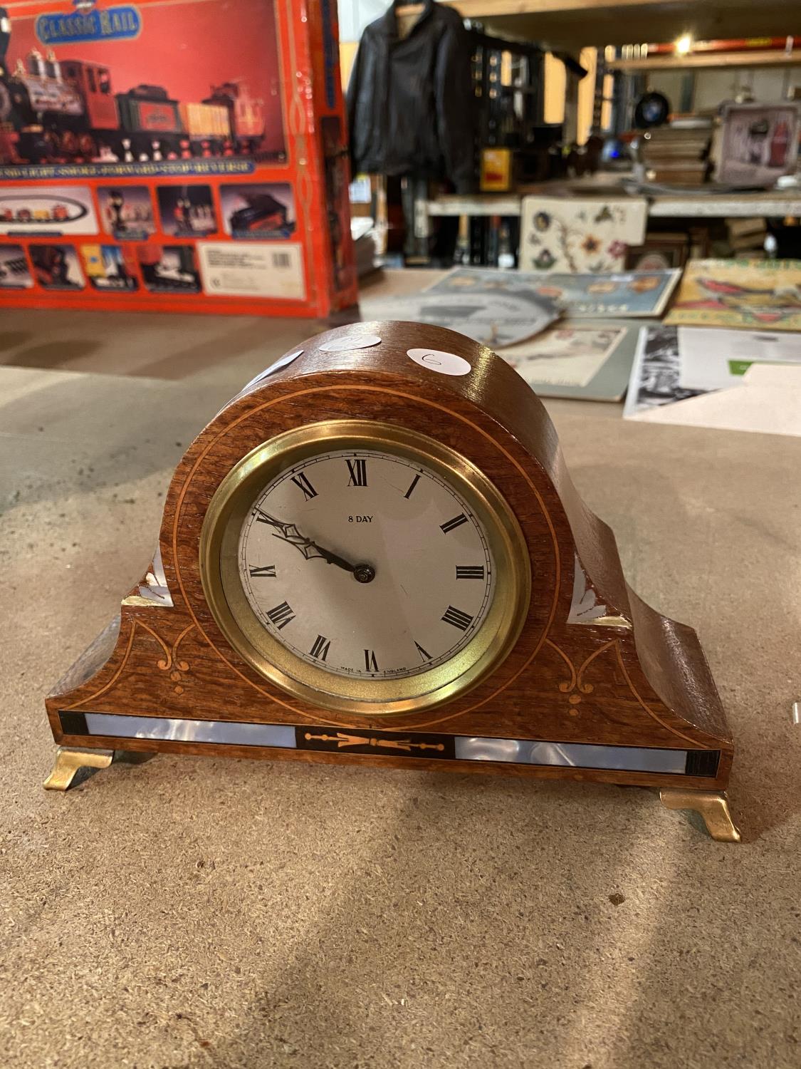 AN INLAID EIGHT DAY MANTLE CLOCK