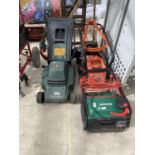 AN ELECTRIC SCARIFIER AND TWO LAWN MOWERS, ALL IN WORKING ORDER