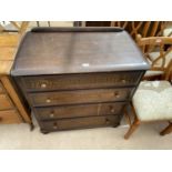 A PRIORY STYLE OAK CHEST OF FOUR DRAWERS