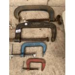 FOUR VARIOUS SIZED G CLAMPS