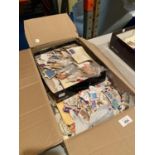 A LARGE BOX CONTAINING STAMPS
