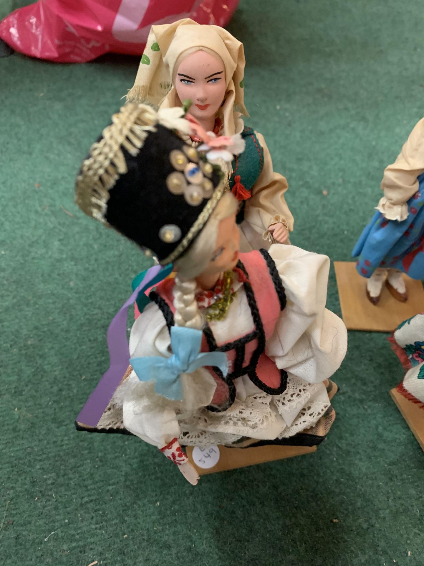 FOUR DOLLS ON WOODEN PLINTHS - Image 2 of 3