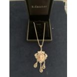 A BOXED SILVER CAMEO NECKLACE