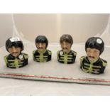 A SET OF FOUR BEATLE TOBY JUGS