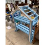 A BLUE AND WHITE PAINTED WOODEN ARBOUR PLANT STAND