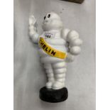 A CAST METAL MICHELIN MONEY BANK WAVING FIGURE