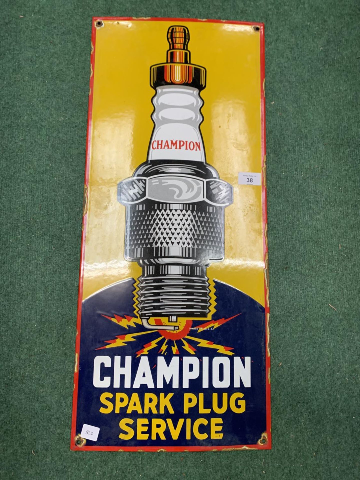 AN ENAMAL CHAMPION SPARK PLUG SIGN