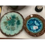 TWO ANTIQUE MAJOLICA POTTERY PLATES TO INCLUDE A BIRD DESIGN EXAMPLE