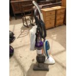 A VAX STEAM HARD FLOOR STEAMER AND A DYSON DC40 VACUUM CLEANER, BOTH IN WORKING ORDER