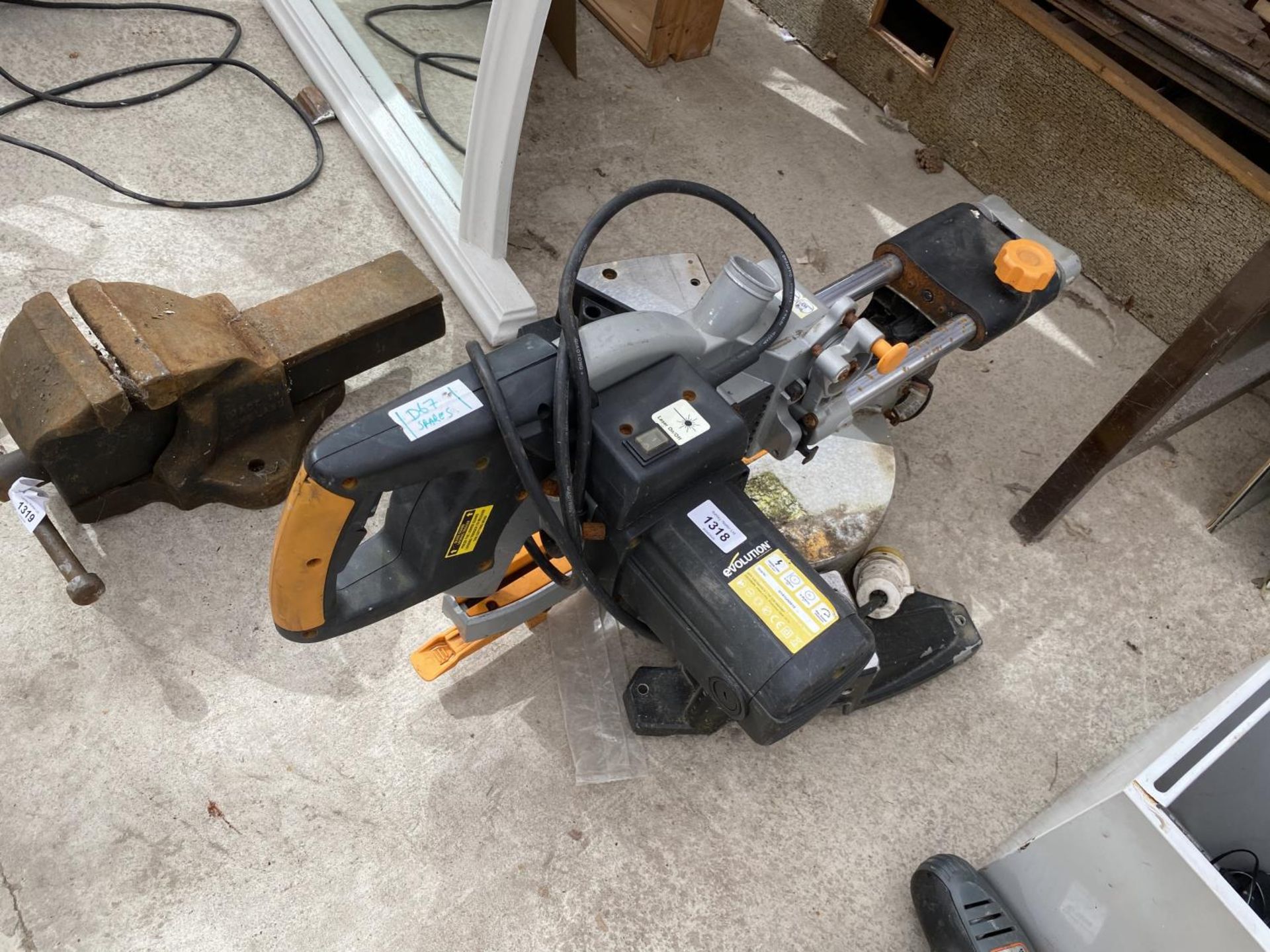 AN EVOLUTION POWER COMPOUND MITRE SAW, IN WORKING ORDER