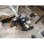 AN EVOLUTION POWER COMPOUND MITRE SAW, IN WORKING ORDER