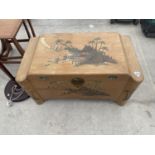 AN ORIENTAL CAMPHOR WOOD BEDDING CHEST