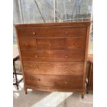 A WILLIS AND GAMBIER CHERRY WOOD CHEST OF THREE SMALL AND FOUR LONG DRAWERS