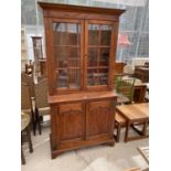 A MAHOGANY BOOKCASE CABINET WITH TWO LOWER DOOORS AND TWO UPPER GLAZED DOORS