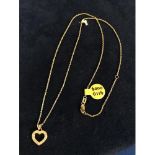 A 9CT GOLD DIAMOND SET HEART PENDANT AND CHAIN, APPROX TOTAL GROSS WEIGHT 1.5 GRAMS