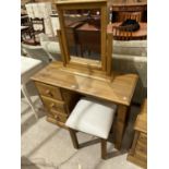 A PINE DRESSING TABLE WITH DRESSING MIRROR AND STOOL