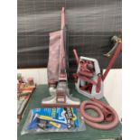A KIRBY LEGEND II VACUUM CLEANER WITH ACCESSORIES - IN WORKING ORDER